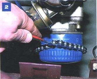 Использование съёмника для отворачивания масляного фильтра на двигателе УМПО-331